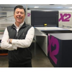 Steve Zick, Executive Vice President, Innomark, stands next to their Inca Onset X2, at the Miamisburg, Ohio facility.