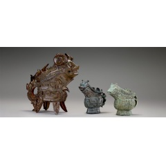 Left to right: Ritual wine pouring vessel (gong) with masks (taotie), dragons, and real animals, Anyang or middle Yangzi region, ca. 1100 B.C., bronze, Gift of Eugene and Agnes E. Meyer, (see complete caption below)