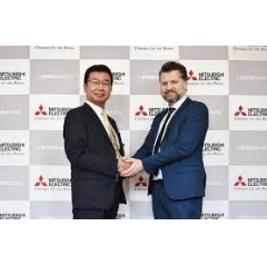 Mitsubishi Electric Executive Officer Noriyuki Takazawa (left) and Scibreak CEO Tomas Modeer