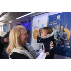 UNICEF/UN0795024/Deeb
On 1 March 2023 in in Aleppo, Syria, UNICEF Executive Director Catherine Russell holds a child while visiting Ahmad Adeeb Al-Ali School (The School Shelter),(see complete caption below)