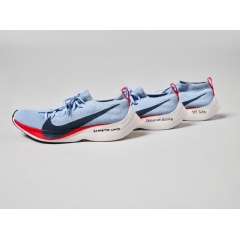 Three custom Nike Zoom Vaporfly Elite shoes, featuring the 4% system, that were worn by the three athletes chasing down a 1:59:59 marathon finish time at Nikes Breaking 2 attempt in May of 2016