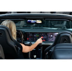 A driver interacts with Watson Assistant within a digital cockpit from automotive electronics innovator HARMAN. (Alan Rosenberg/Feature Photo Service for IBM)
