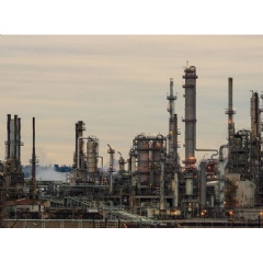 Refineries and other oil and gas facilities are known to release methane in the course of operations. Credit: angeldibilio/Adobe Stock