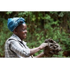 Charity Njeri Gachanja, a stoves producer in Kenya Muranga County preparing the clay for the ceramic liner production,  GIZ