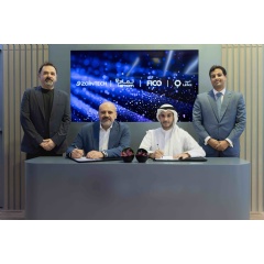 Andrew Hanna, ZainTECH CEO (seated left) and Yousef Al Musaileem, CEO of Tamam (seated right) with FICO (L) and LEAN (R) executives standing