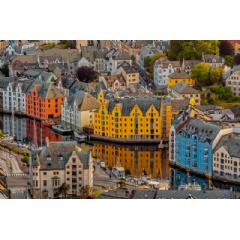 Alesund is a port and tourist city at the entrance to the Geirangerfjord. Cityscape image of Alesund at dawn.