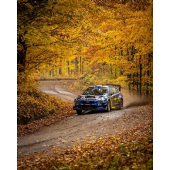 Brandon Semenuk and Keaton Williams snake through a left-right sequence surrounded by Lake Superior
Performance Rallys legendary fall scenery.