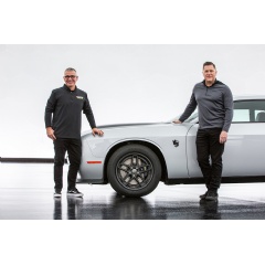Dominick Montouri (left), President of Mickey Thompson and Tim Kuniskis (right), Dodge brand CEO, Stellantis, pose with the new 2023 Dodge Challenger SRT Demon 170. (see complete caption below)