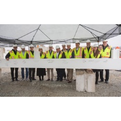 Members of the Stellantis and Samsung SDI joint venture management team, along with Kokomo Mayor Tyler Moore (eighth from left) (see complete caption below)