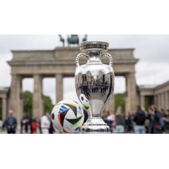 The Henri Delaunay Cup is displayed at the Brandenburg Gate in Berlin during the UEFA EURO 2024 Trophy Tour. UEFA via Getty Images