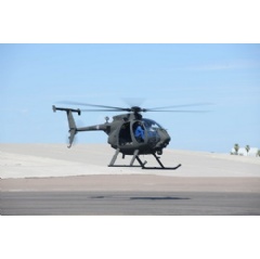 Shown here, the first AH-6 Little Bird light attack helicopter for the Royal Thai Army takes flight for the first time at Boeings Mesa, Ariz. site. (Boeing photo)