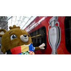 Albaert, mascot of the UEFA Euro 2024 European Football Championship, poses next to an ICE high speed train. (Photo by Kirill KUDRYAVTSEV / AFP) (Photo by KIRILL KUDRYAVTSEV/AFP via Getty Images) AFP via Getty Images