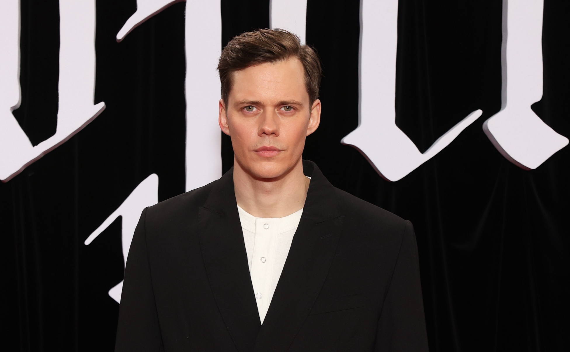 Bill Skarsgård wears a look from the H&M Atelier SpringSummer