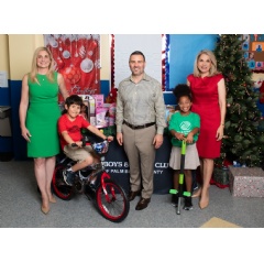 (Left to right) Boys & Girls Clubs of Palm Beach County President & CEO Jaene Miranda, Ethan, GL Homes President Misha Ezratti, Kamryn and GL Homes Vice President of Community Relations Sarah Alsofrom.